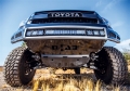 Picture of N-Fab M-RDS Front Bumper 07-13 Toyota Tundra - Gloss Black w-Silver Skid Plate