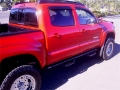Picture of N-Fab Nerf Step 05-15 Toyota Tacoma Double Cab - Gloss Black - Cab Length - 2in