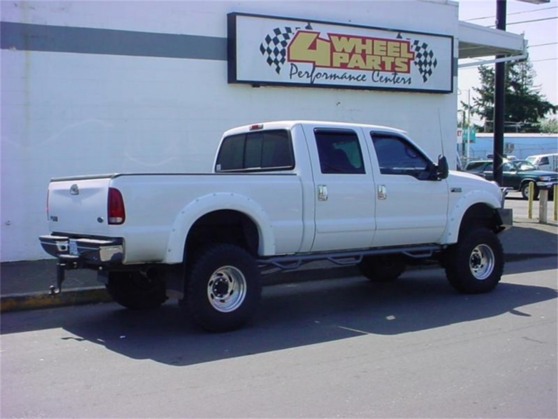 Picture of N-Fab Nerf Step 99-16 Ford F-250-350 Super Duty Crew Cab 6-75ft Bed - Gloss Black - Bed Access - 3in