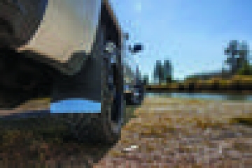 Picture of Husky Liners Universal 12in Wide Black Rubber Front Mud Flaps w- Black Weight