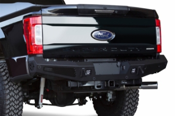 Picture of Addictive Desert Designs 17-18 Ford F-250 HoneyBadger Rear Bumper w- Backup Sensor Cutouts