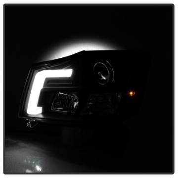 Picture of Spyder 04-15 Nissan Titan - 04-07 Nissan Armada V2 Projector Headlights - Black PRO-YD-NTI04-DRL-BK