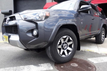 Picture of Rally Armor 12-24 Toyota 4Runner Black UR Mud Flap w-White Logo