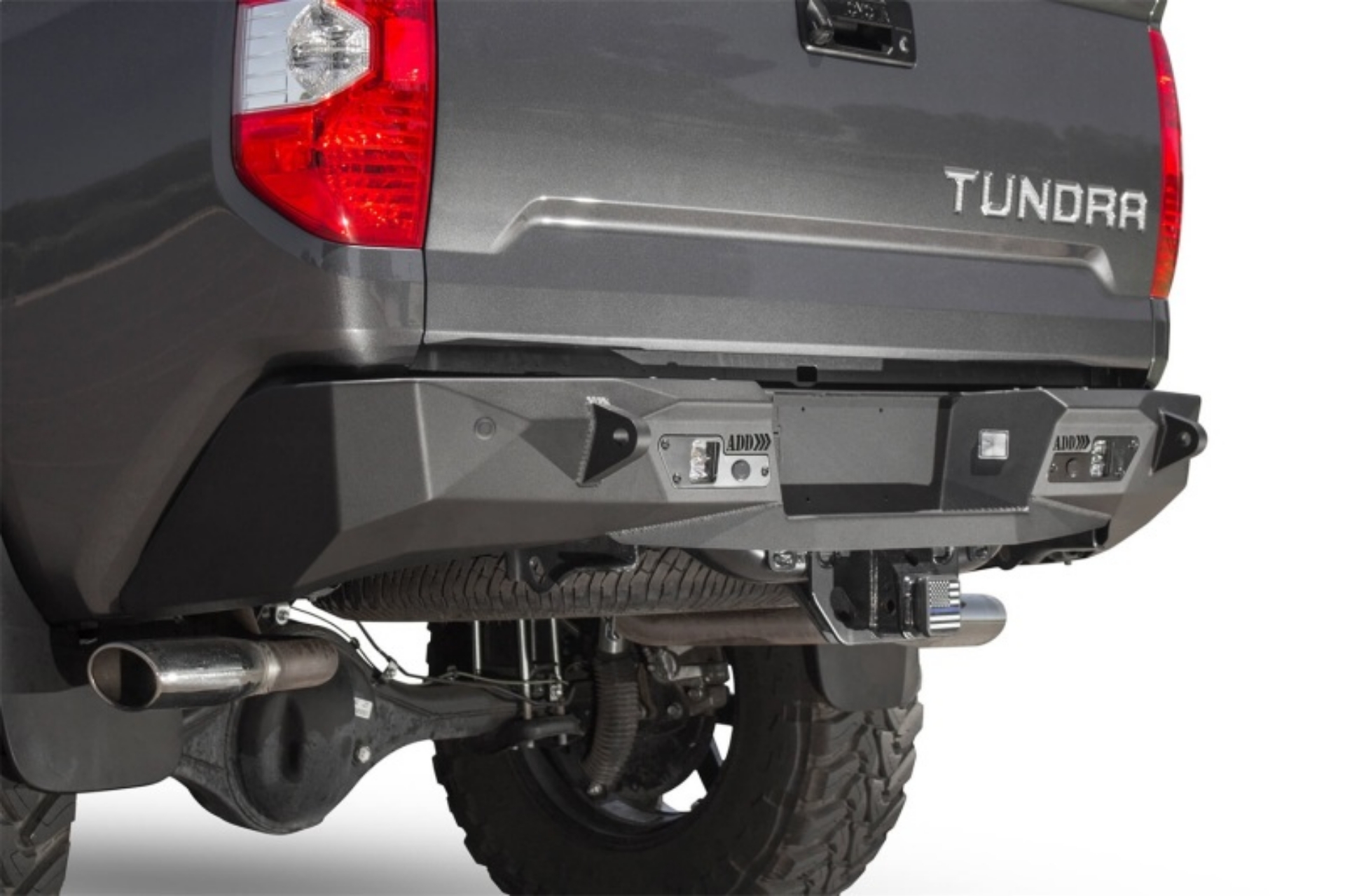 Picture of Addictive Desert Designs 2014+ Toyota Tundra Stealth Fighter Rear Bumper w- Backup Sensor Cutouts