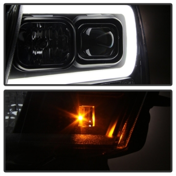 Picture of Spyder 07-14 Chevy Suburban-1500-2500-Tahoe V2 Projector Headlights Blk PRO-YD-CSUB07V2-DRL-BK