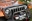 Picture of Rugged Ridge Wraparound Bug Deflector Smoke 07-18 Jeep Wrangler