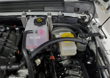 Picture of J&L 18-25 Jeep Wrangler JL 3-6L Driver Side Oil Separator 3-0 - Clear Anodized