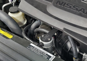 Picture of J&L 16-24 Nissan Titan 5-6L Passenger Side Oil Separator 3-0 - Clear Anodized