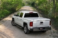 Picture of UnderCover 2018 GMC Sierra 1500 19 Limited 5-8ft Lux Bed Cover - Glory Red