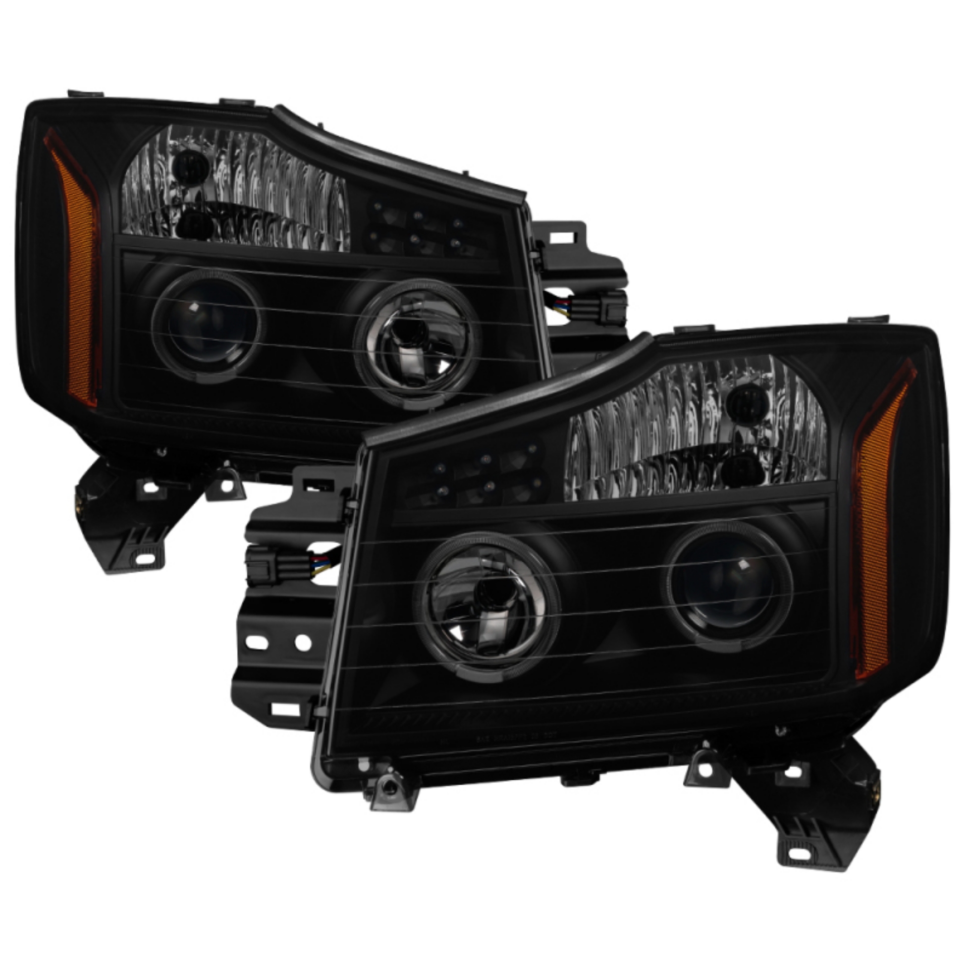 Picture of xTune Nissan Titan 04-15 Projector Headlights - LED Halo - Black Smoked PRO-JH-NTI04-LED-BSM