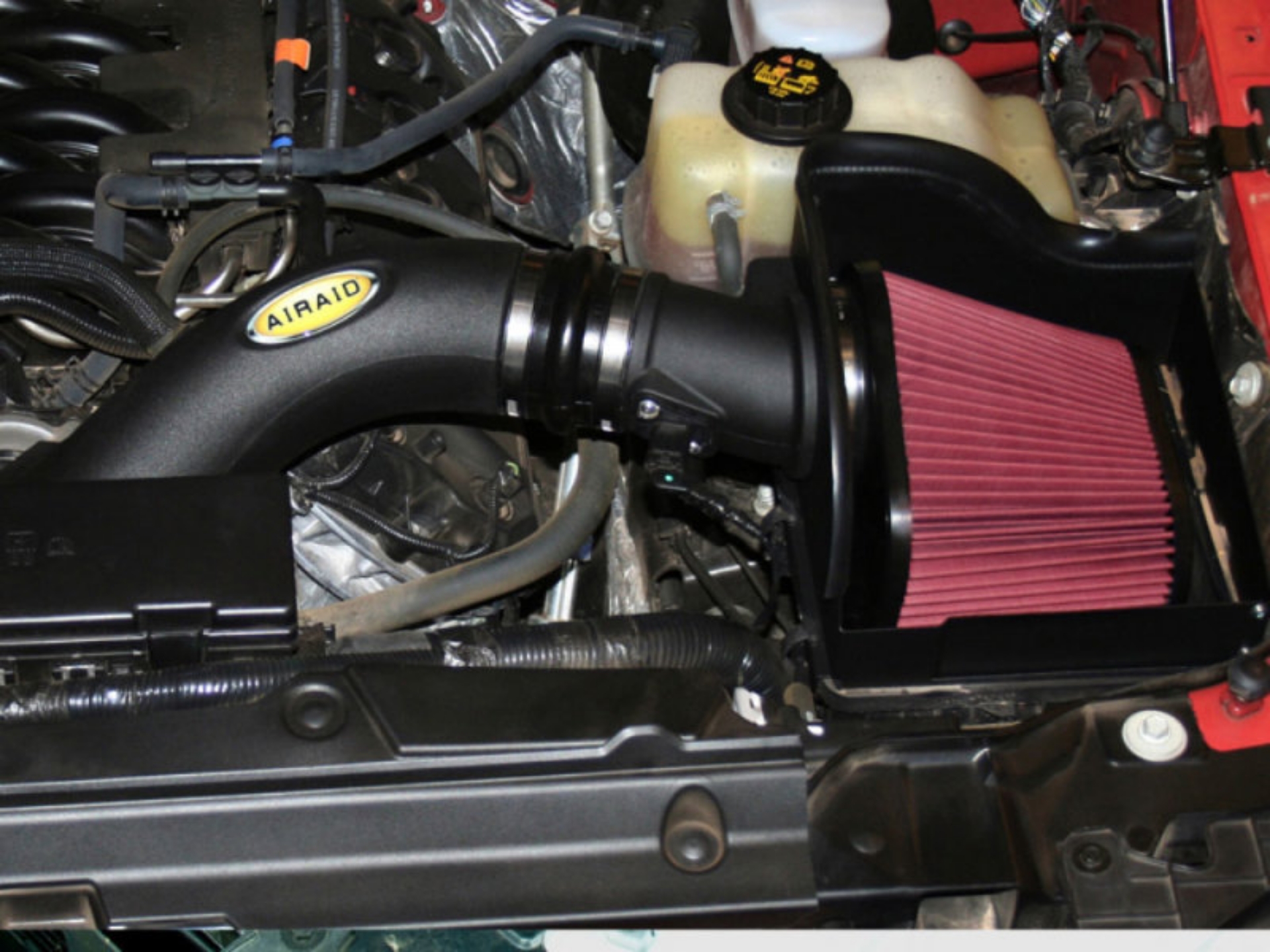 Picture of Airaid 11-13 Ford F-150 5-0L CAD Intake System w- Tube Oiled - Red Media