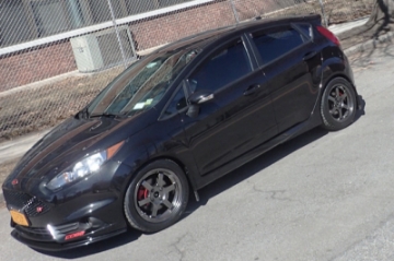 Picture of Rally Armor 13-19 Ford Fiesta ST Black UR Mud Flap w-Red Logo