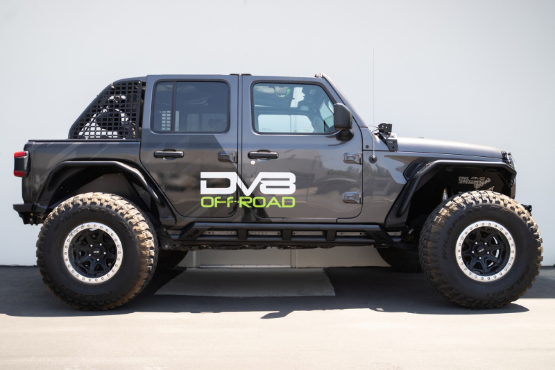 Picture of DV8 Offroad 18-23 Jeep Wrangler JL 4 Door FS-15 Series Rock Sliders