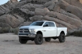 Picture of Fabtech 14-18 Ram 2500 4WD 5in Basic System w-Coil Spacers & Perf- Shocks