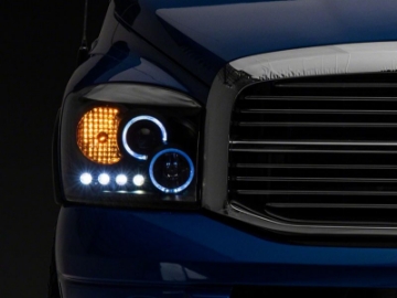 Picture of Raxiom 06-08 Dodge RAM 1500 LED Halo Projector Headlights- Blk Housing Clear Lens