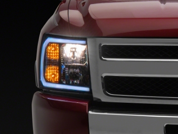 Picture of Raxiom 07-13 Chevrolet Silverado 1500 Axial Headlights w- SEQL LED Bar- Blk Housing Clear Lens