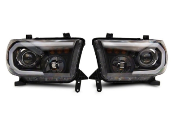 Picture of Raxiom 07-13 Toyota Tundra Axial Projector Headlights w- SEQL LED Bar- Blk Housing Clear Lens