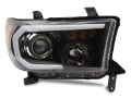 Picture of Raxiom 07-13 Toyota Tundra Axial Projector Headlights w- SEQL LED Bar- Blk Housing Clear Lens