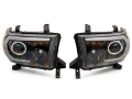 Picture of Raxiom 07-13 Toyota Tundra Axial Series Projector Headlights w- LED Bar- Blk Housing Clear Lens