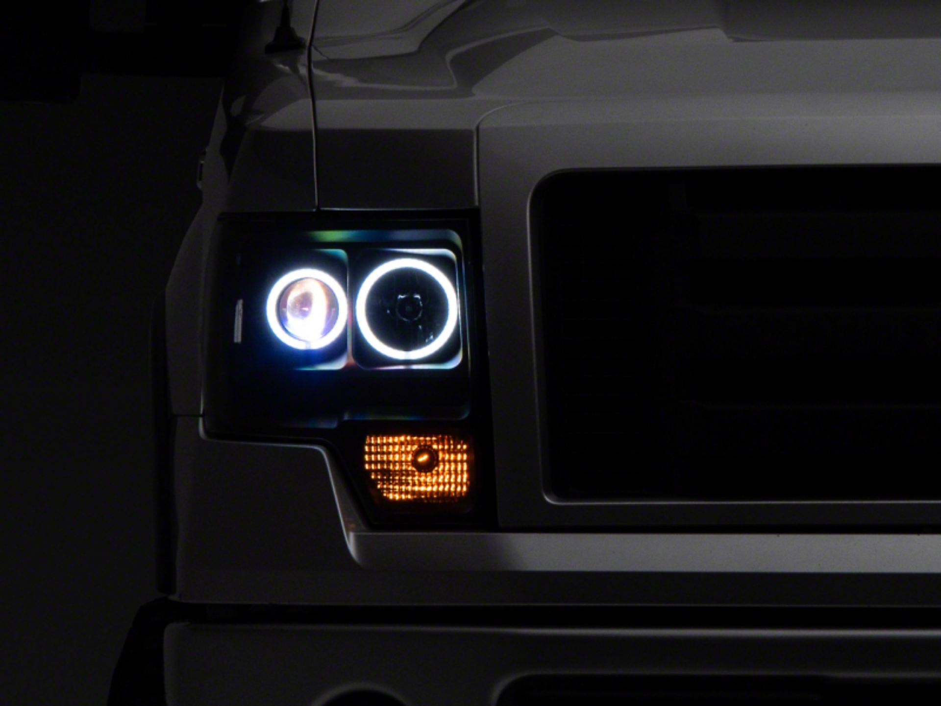 Picture of Raxiom 09-14 Ford F-150 Super White LED Halo Projector Headlights- Blk Housing Clear Lens