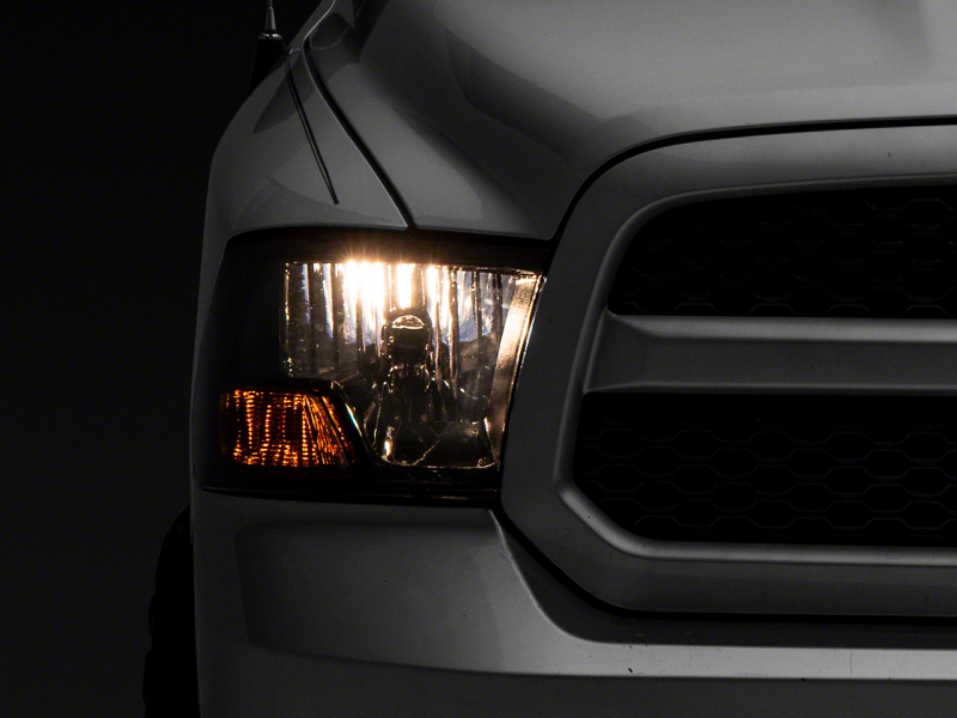 Picture of Raxiom 09-18 Dodge RAM 1500 Axial OEM Rep Headlights w- Single Bulb- Chrome Housing Smoked Lens