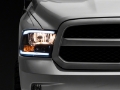 Picture of Raxiom 09-18 Dodge RAM 1500-2500-3500 Axial Series Headlights w- LED Bar- Blk Housing Clear Lens