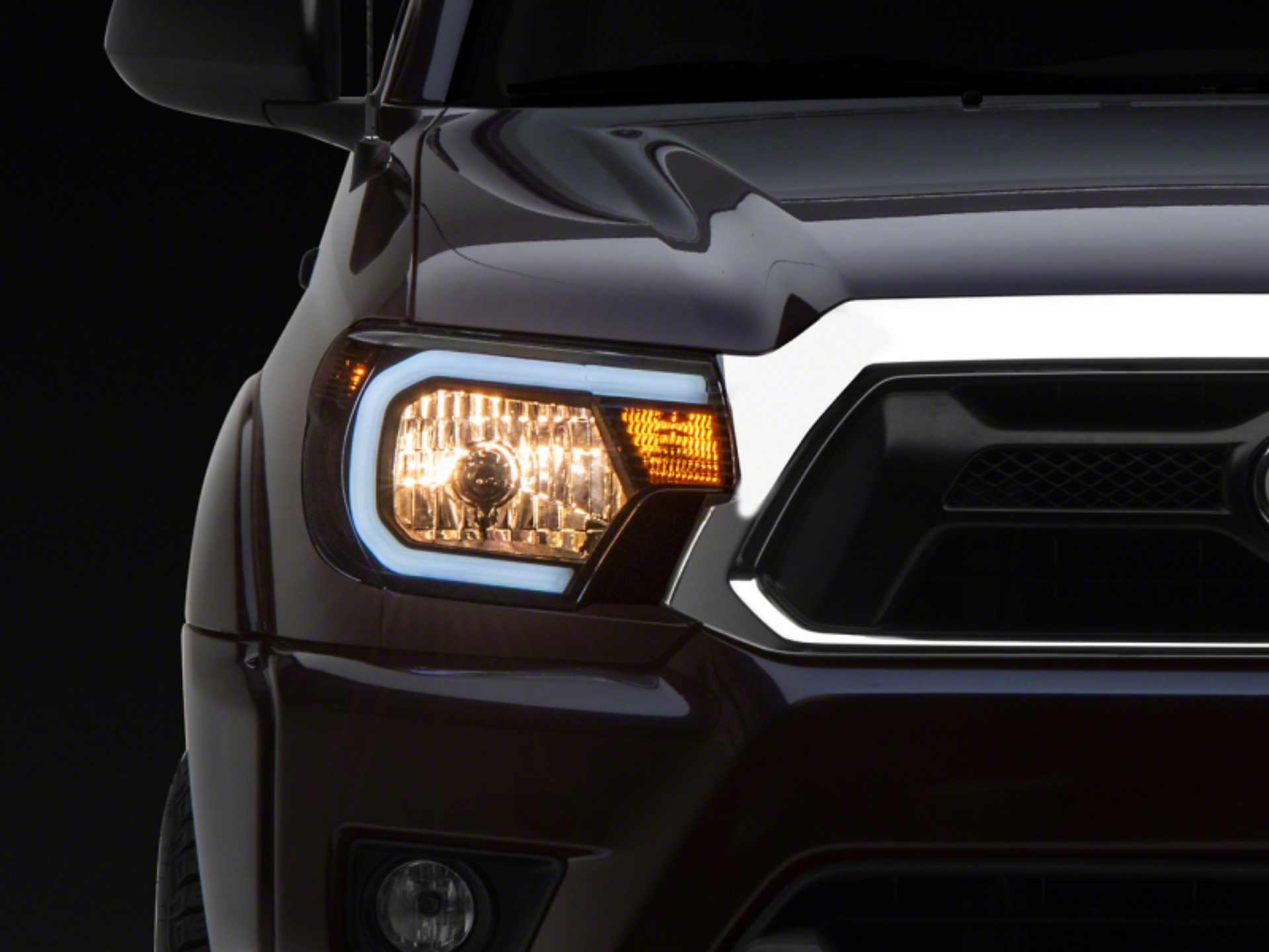 Picture of Raxiom 12-15 Toyota Tacoma Axial Series Headlights w- LED Bar- Blk Housing Clear Lens