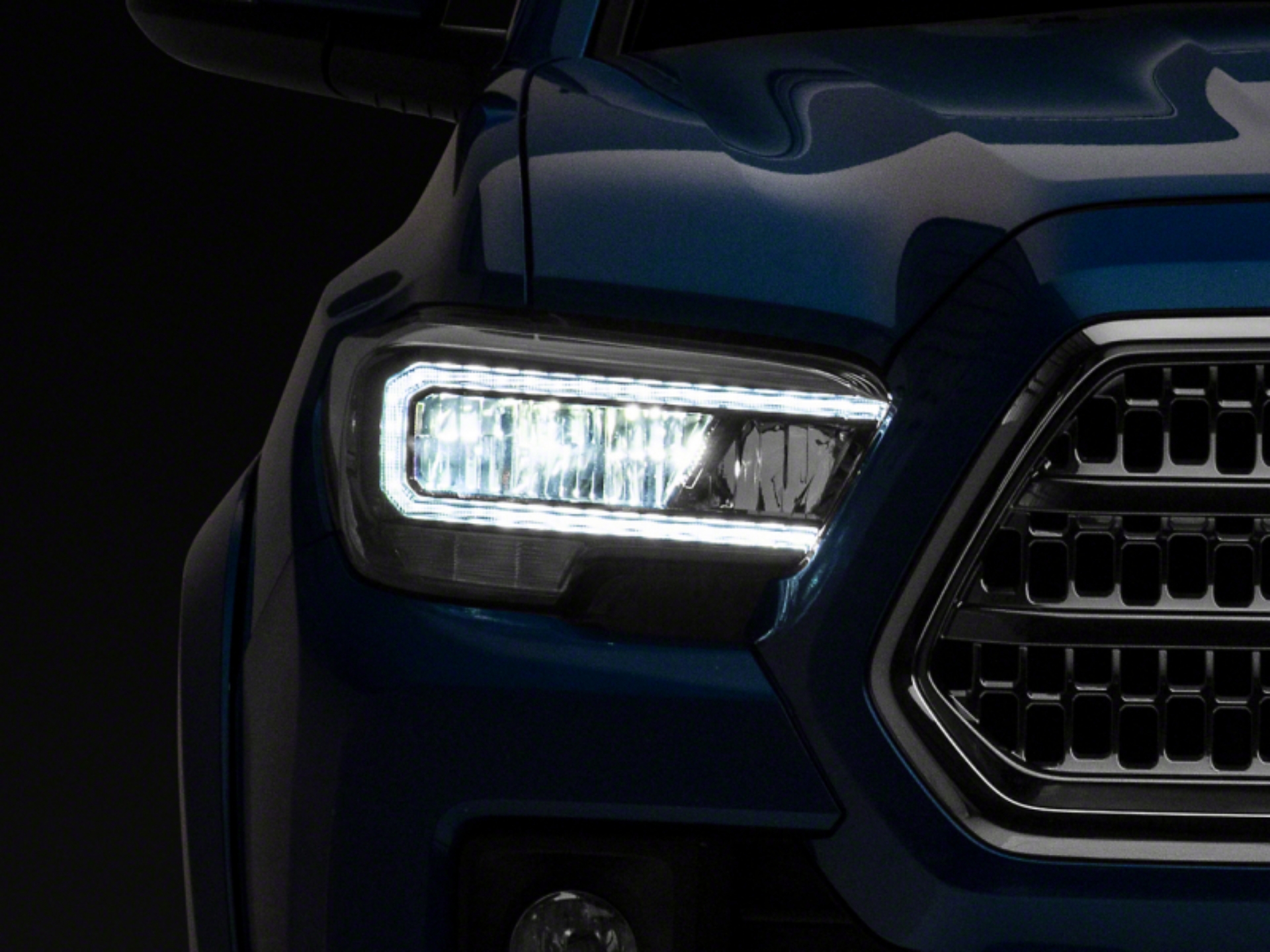 Picture of Raxiom 16-23 Toyota Tacoma w- Factory Halogen DRL LED Headlights- Blk Housing Clear Lens