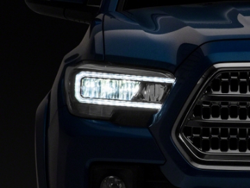 Picture of Raxiom 16-23 Toyota Tacoma w- Factory Halogen DRL LED Headlights- Blk Housing Clear Lens