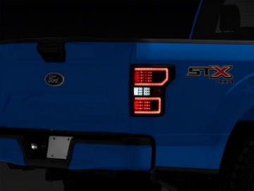 Picture of Raxiom 18-20 Ford F-150 Axial Series LED Tail Lights w- SEQL Turn Signals- Blk Housing Clear Lens