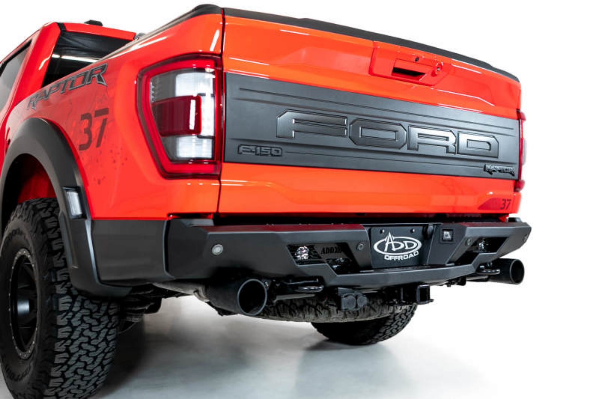 Picture of Addictive Desert Designs 2022+ Ford Raptor Stealth Fighter R Bumper w- 2 Cube Lights - Hammer Black