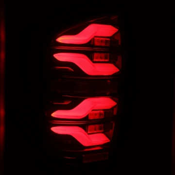 Picture of AlphaRex 16-21 Toyota Tacoma LUXX LED Taillights Blk-Red w-Activ Light-Seq Signal