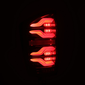 Picture of AlphaRex 16-21 Toyota Tacoma LUXX LED Taillights Alpha Blk w-Activ Light-Seq Signal