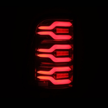Picture of AlphaRex 19-21 Dodge Ram 1500 Luxx-Series LED Tail Lights Black-Red w-Activ Light-Seq Signal