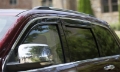 Picture of AVS 21-22 Jeep Grand Cherokee Ventvisor Low Profile Deflectors 4pc - Smoke w-Chrome Trim