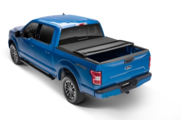 Picture of Lund 22-23 Nissan Frontier 5ft- Bed - Genesis Elite Tri-Fold Tonneau Cover - Black
