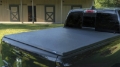 Picture of Lund 22-23 Nissan Frontier 5ft- Bed - Genesis Tri-Fold Tonneau Cover - Black
