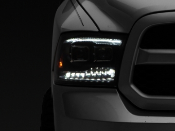 Picture of Raxiom 09-18 RAM 1500 LED Projector Headlights w- Switchback Turn Signals- Blk Housing Clear Lens