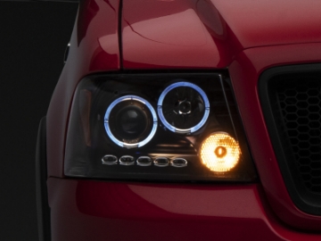 Picture of Raxiom 04-08 Ford F-150 Dual LED Halo Projector Headlights- Black Housing Clear Lens