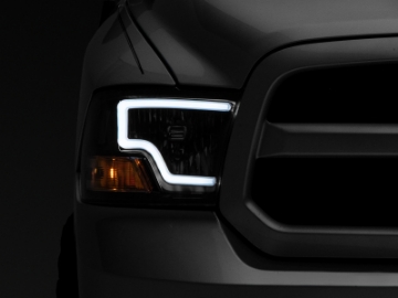 Picture of Raxiom 09-18 Dodge RAM 1500 LED Bar Headlights- Black Housing Clear Lens