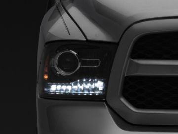 Picture of Raxiom 09-18 Dodge RAM 1500 LED Halo Headlights w-Switchback Turn Signals- Blk Housing Clear Lens