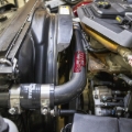 Picture of Wehrli 10-18 Dodge 6.7L Cummins (Non 13-15 w/Dual Rads) Upper Coolant Pipe - Sparkle Bomber Orange