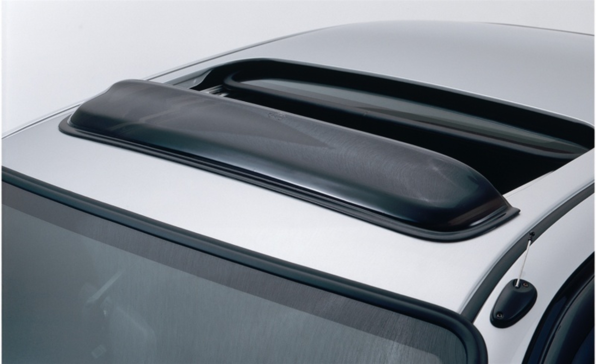 Picture of AVS Universal Windflector Classic Sunroof Wind Deflector (Fits Up To 38.5in.) - Smoke