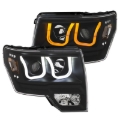 Picture of ANZO 2009-2014 Ford F-150 Projector Headlights w/ U-Bar Switchback Black w/ Amber