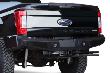 Picture of Addictive Desert Designs 17-18 Ford F-250 HoneyBadger Rear Bumper w/ Backup Sensor Cutouts