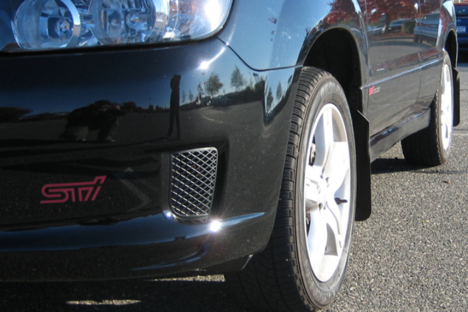 Picture of Rally Armor 03-08 Subaru Forester Basic Black Mud Flap w/ Black Logo