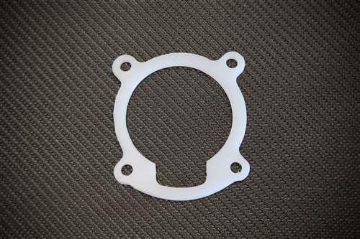 Picture of Torque Solution Thermal Throttle Body Gasket: Hyundai Genesis 2.0 Turbo 10-12