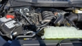 Picture of J&L 2011-2025 Ford F-150 2.7L/3.5L/5.0L Passenger Side Oil Separator 3.0 - Black Anodized