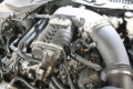 Picture of J&L 11-17 Ford Mustang GT (w/Roush/VMP Supercharger) Driver Side Oil Separator 3.0 - Black Anodized