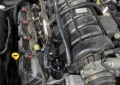 Picture of J&L 05-23 Dodge Charger 5.7L Hemi Passenger Side Oil Separator 3.0 - Black Anodized